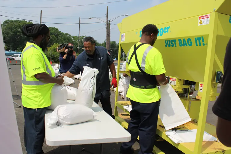 DPW&T Staff handing out sandbags 