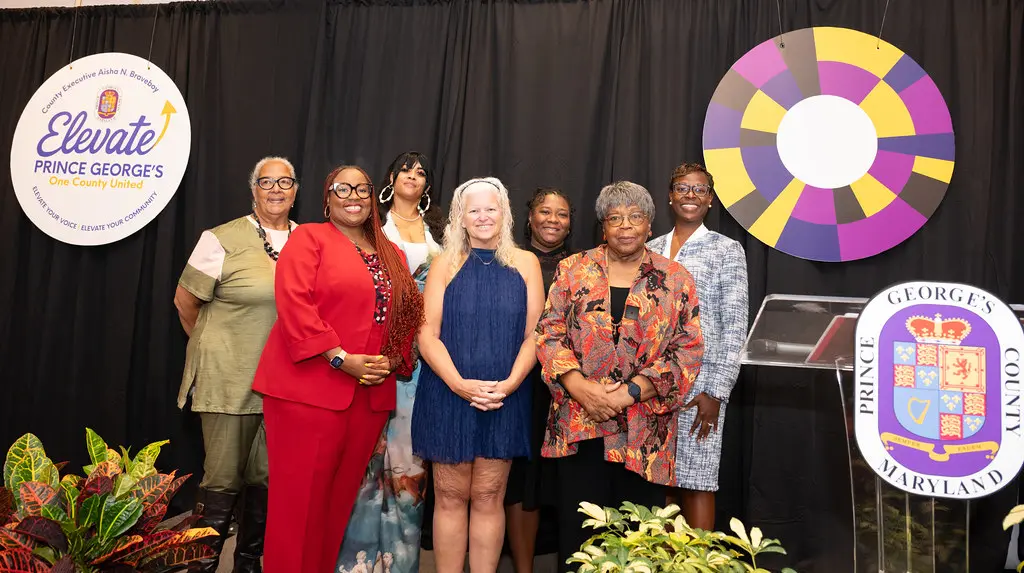 Photo of the commissioners of the commission on common ownership communities on stage