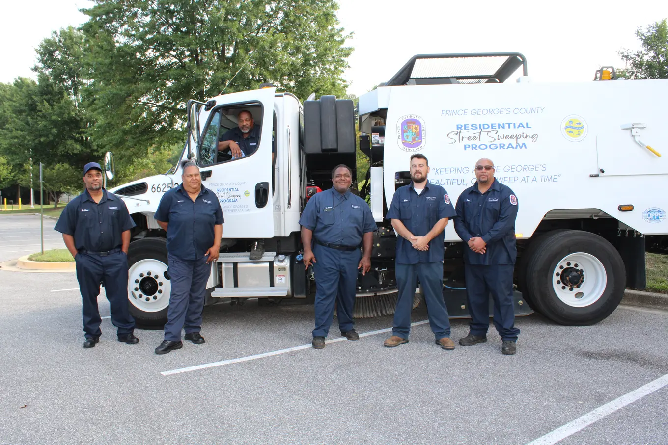DPW&T Crews in front of Street Sweeping Truck