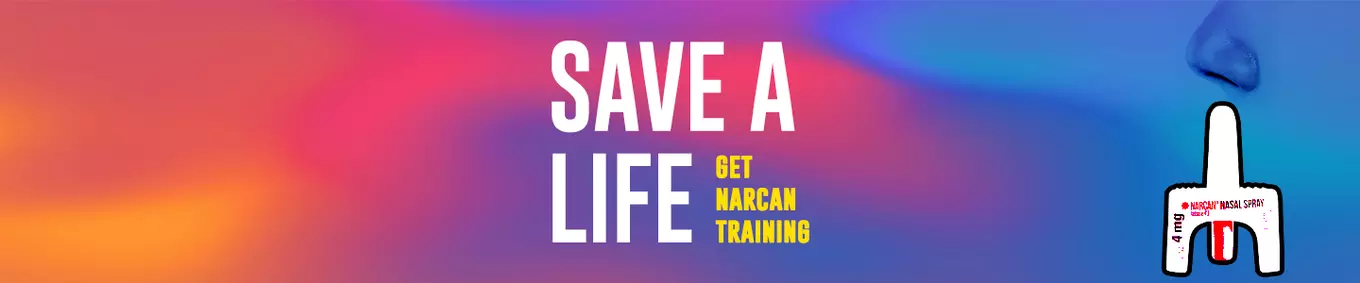 A graphic with the words " Save A Life: Get Narcan Training" the background is a colorful gradient consisting of orange, yellow, pink, & blue with a nose in the top left corner receiving Narcan treatment. 