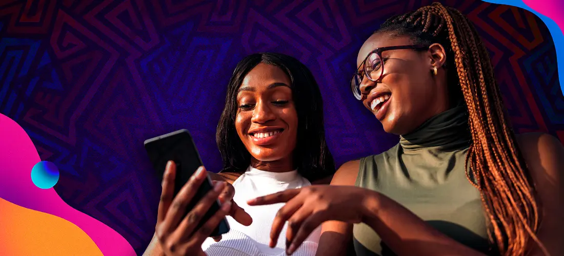 Two Teen girls looking at cellphone