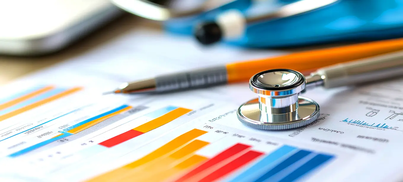 Data Chart, stethoscope, and writing pen grouped together