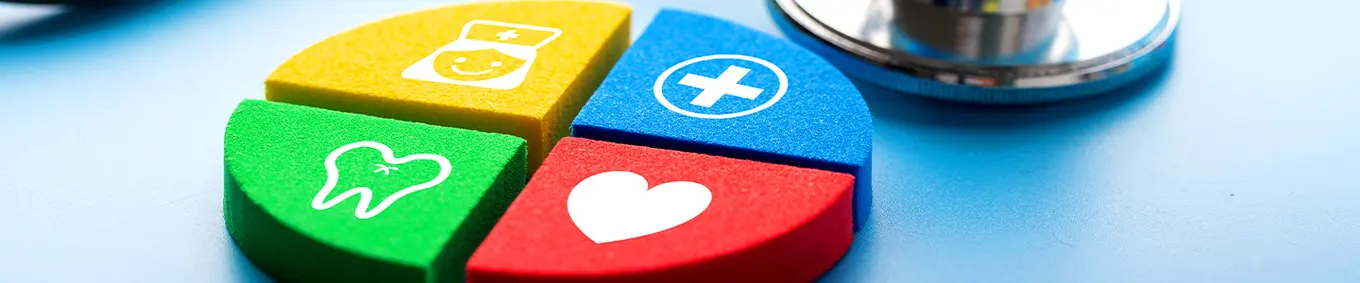 4 colorful blocks of yellow, blue, green, and red with icons depicting medical services.