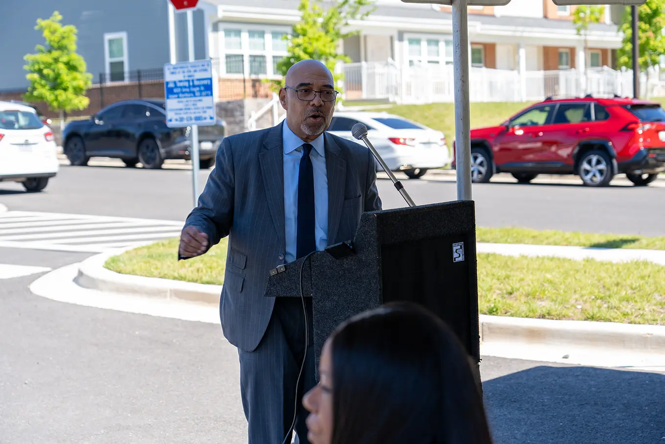 Executive Director Perry Paylor talking on a podium
