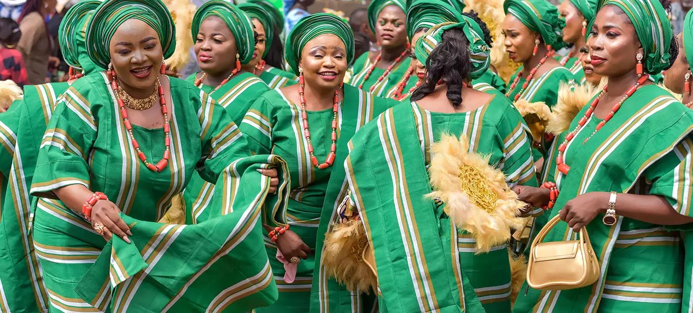 Women celebrating in traditional African attire
