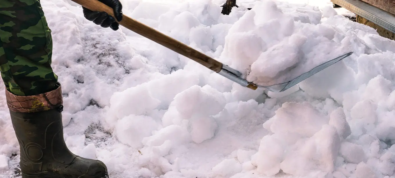 Person shoveling snow