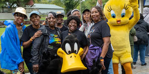 Senior Picnic Group Photo with Six Flags America Characters