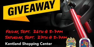 wheel lock on steering wheel. Yellow banner with Giveaway written across.