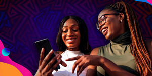 Two Teen girls looking at cellphone