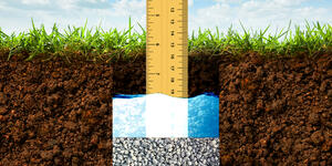 Ruler measuring outdoor ground for PERC Testing.