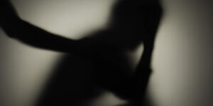 Picture of someone comforting a sad person 