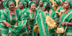 Women celebrating in traditional African attire