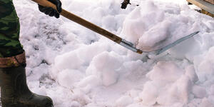 Person shoveling snow