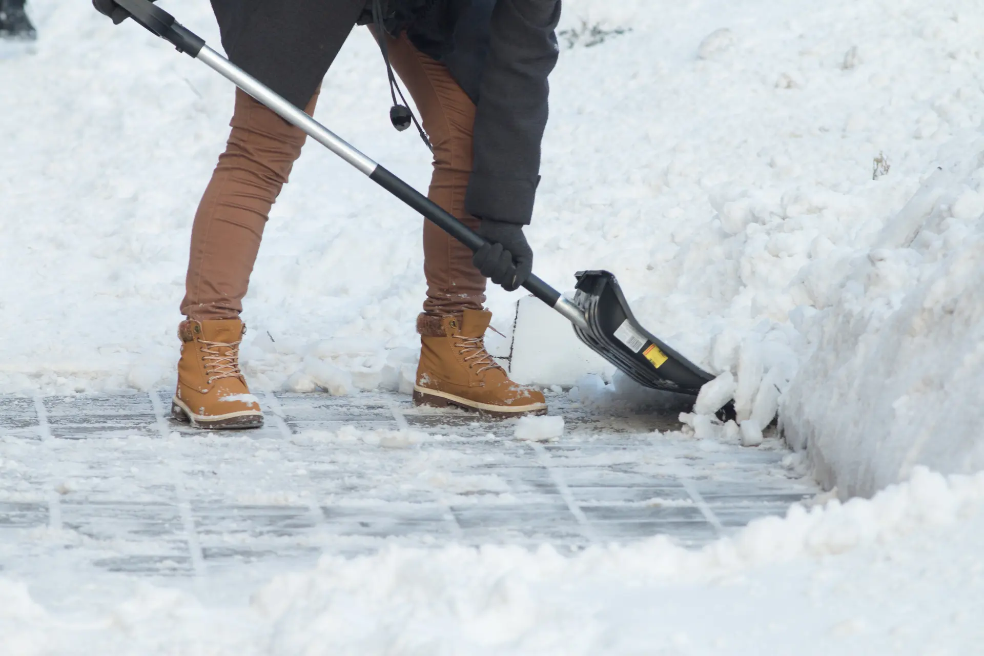 Person shoveling snow