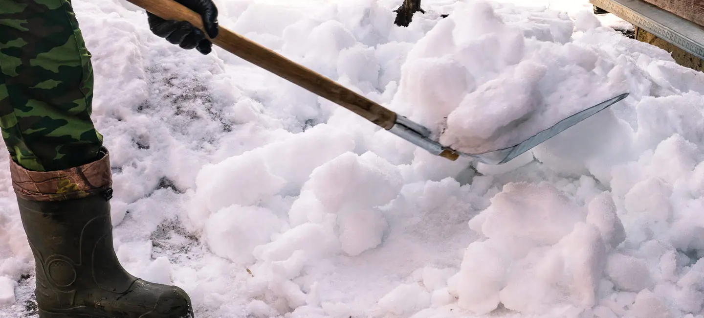 Person shoveling snow