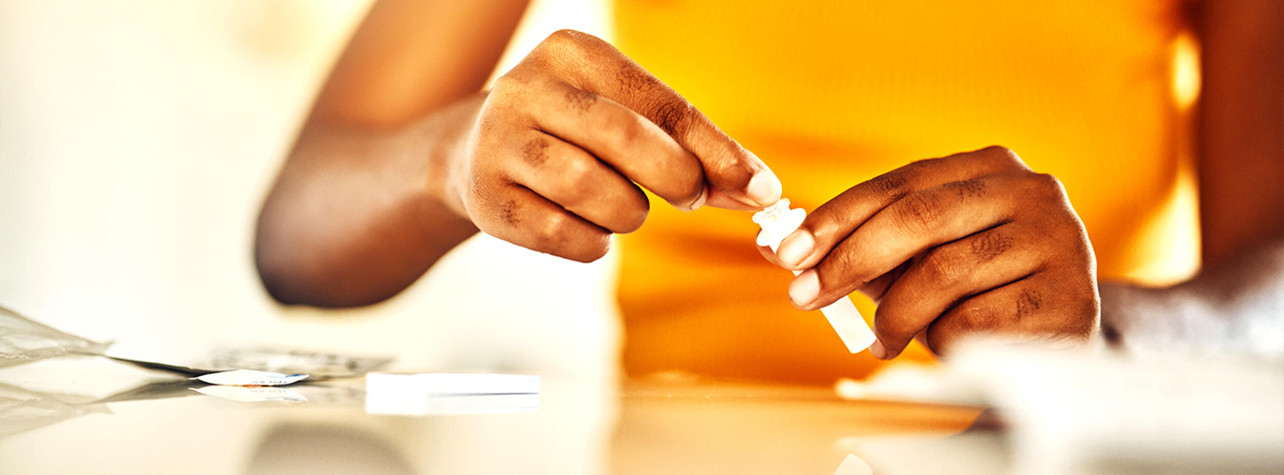 A woman conducting an HIV screening on herselfHIV Testing Day